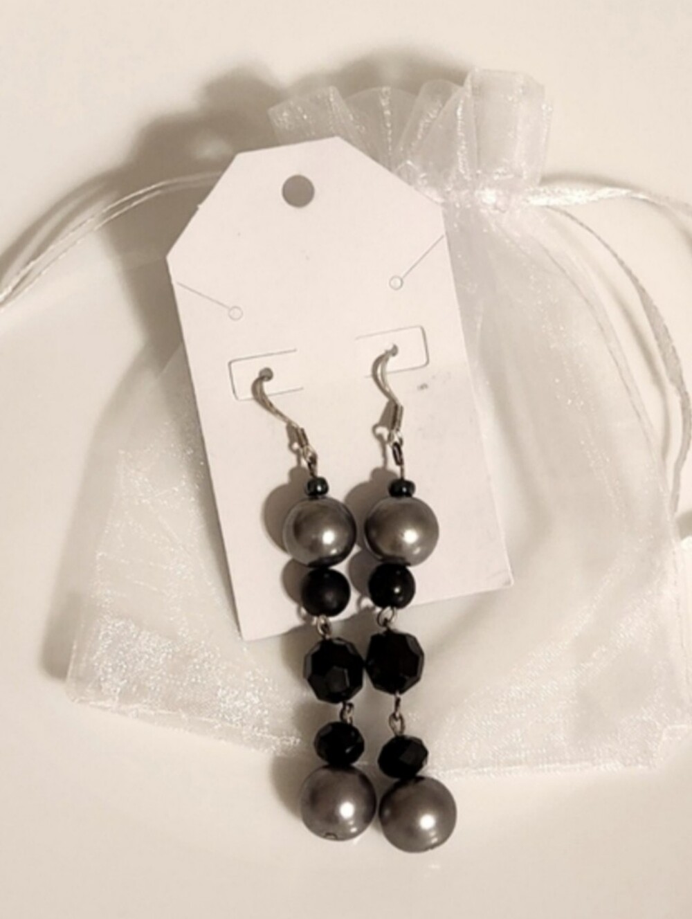 Grey Simulated Pearl Earrings With Black Rhinestones